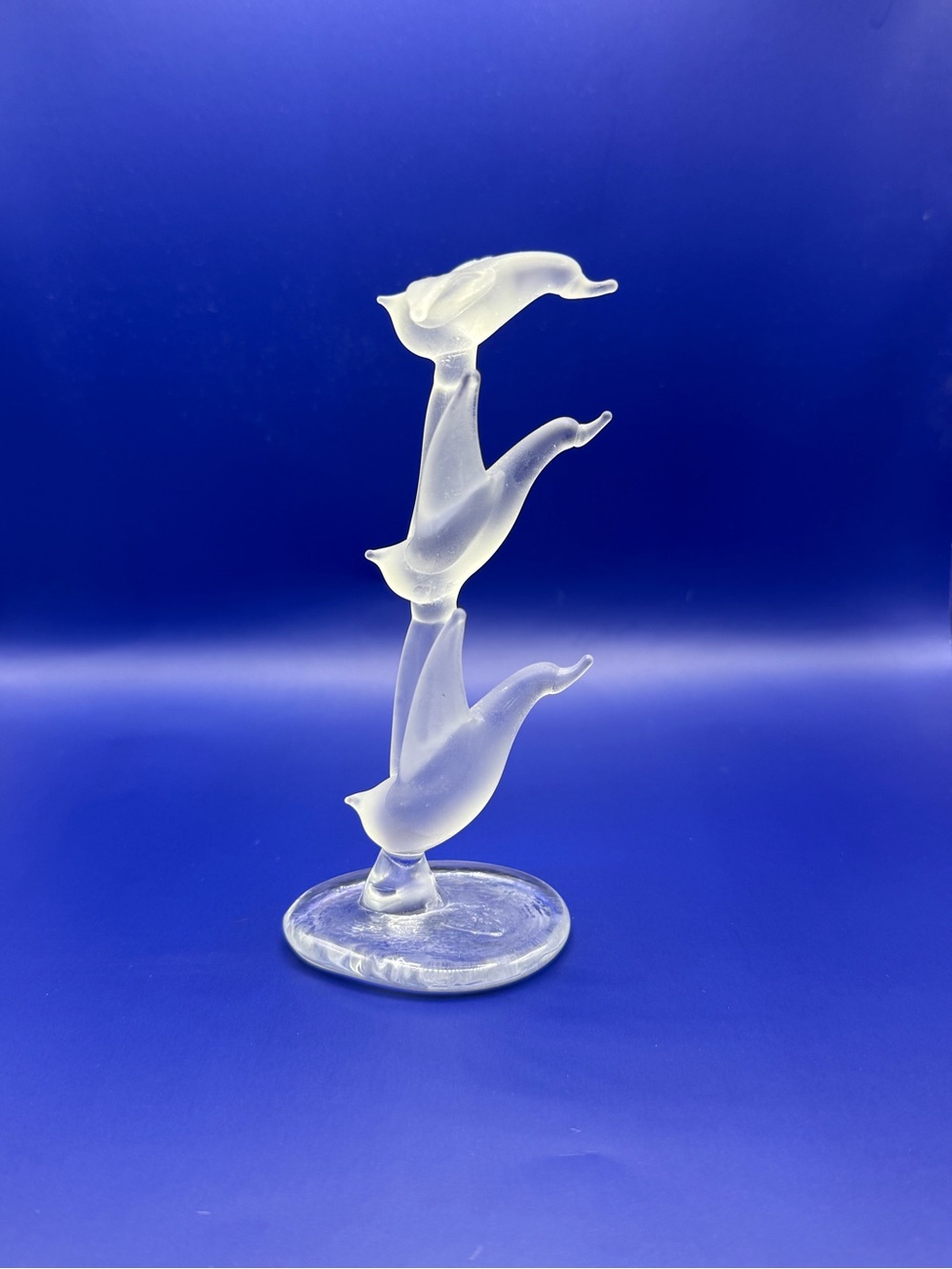 Frosted glass bird figure with clear base